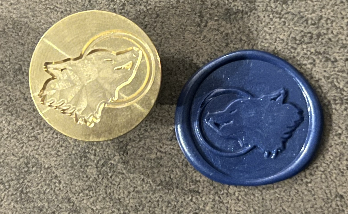 Siegelstempel heulender Wolf im Mondschein